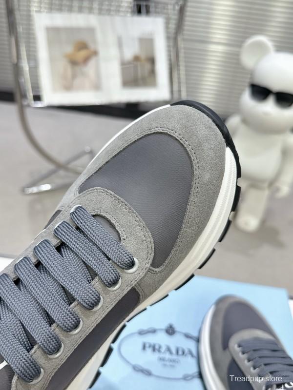 2025 Unisex Prada Grey Suede Leather Sneakers KFY00310